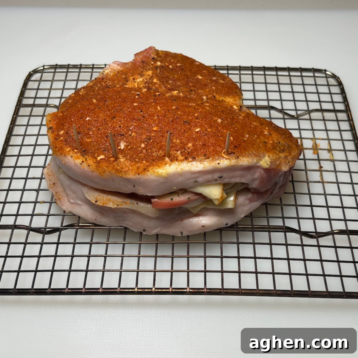 stuffed pork chop ready for grilling