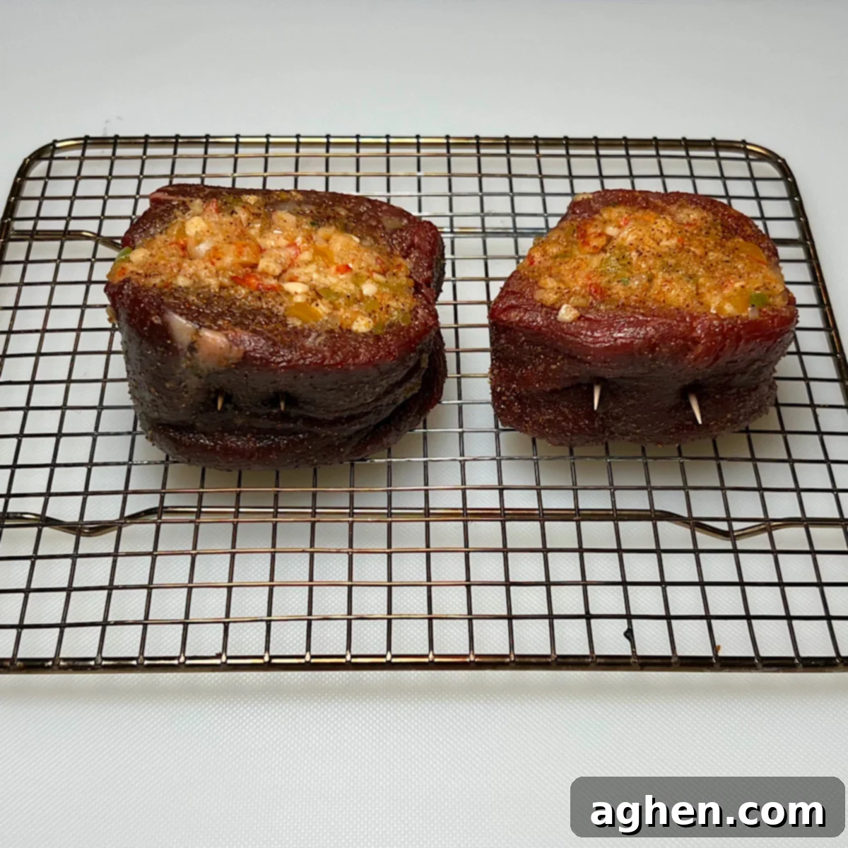 Kettle-Grilled Stuffed Filet Mignon Masterpiece 6 stuffed filet mignon on wire rack ready for grilling