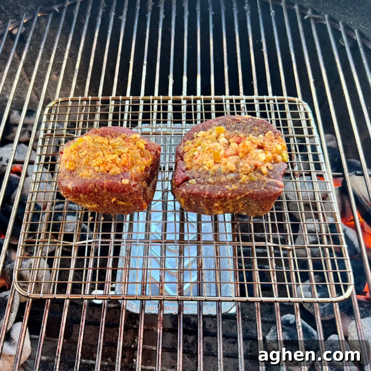 Kettle-Grilled Stuffed Filet Mignon Masterpiece 7 stuffed filet mignon on grill grate