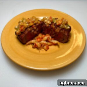 Kettle-Grilled Stuffed Filet Mignon Masterpiece 9 filet mignon on yellow plate