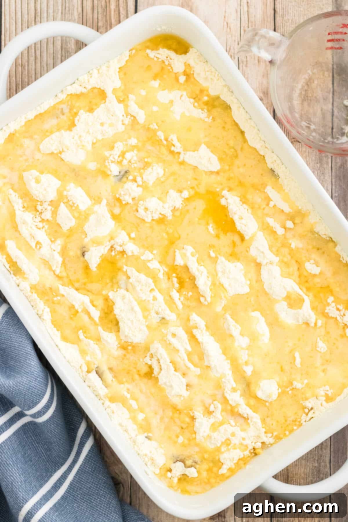 Melted butter drizzled over apple pie filling and cake mix.