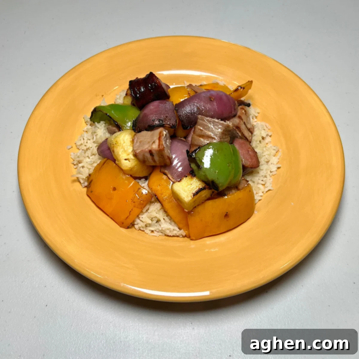 Grilled Tuna Skewers 2 Grilled Ahi Tuna and Vegetables on a Bed of Rice with Chorizo