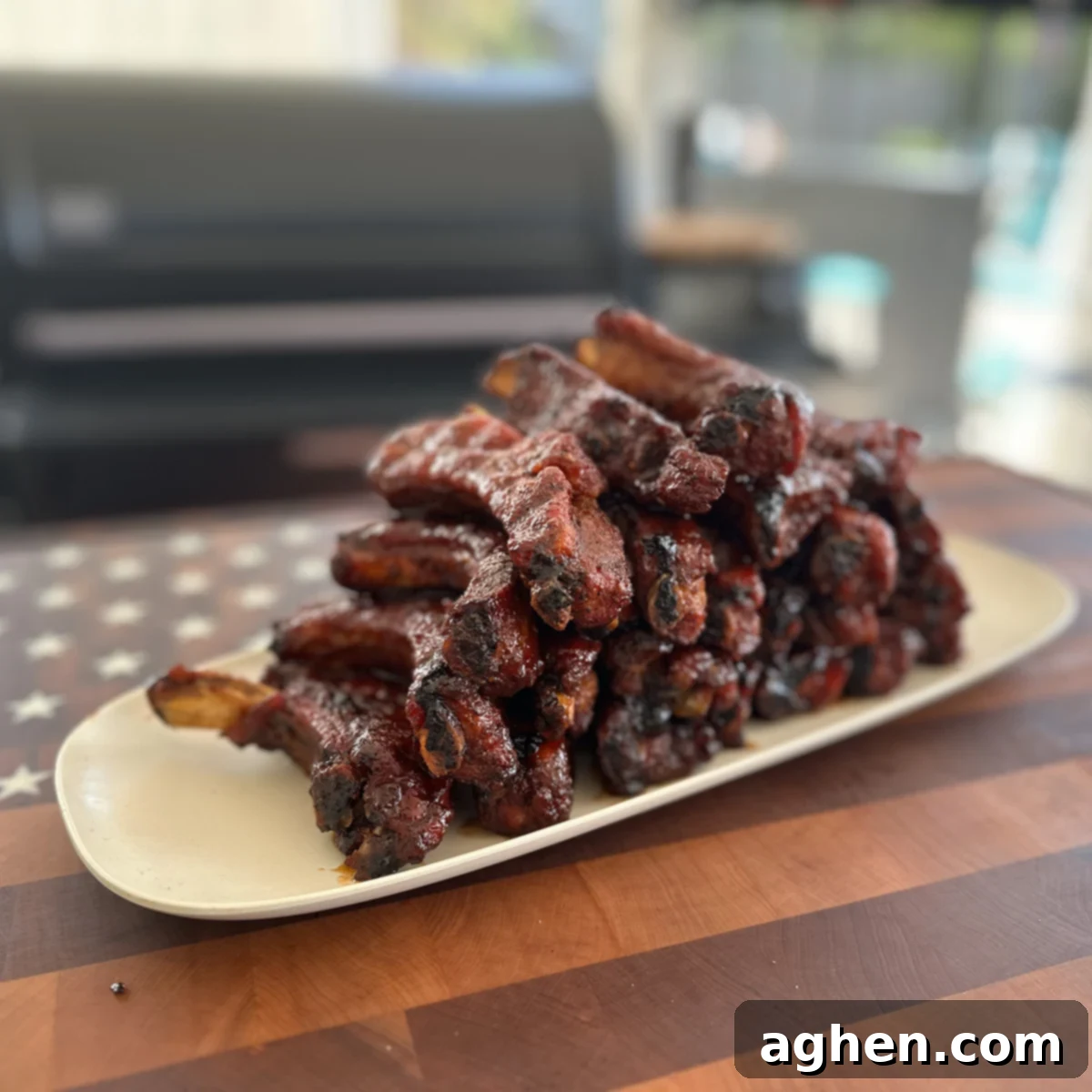 This Party Ribs Trick Is A Game Changer 2 Individual smoked party ribs on a tray