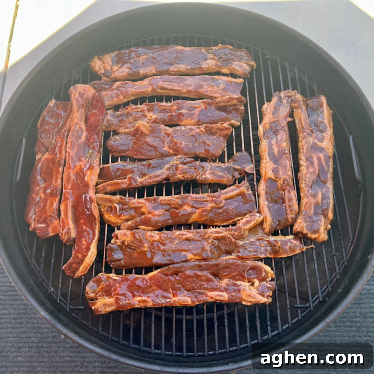 Competition BBQ Vet Reveals Korean Ribs Secrets 6 raw Korean style ribs on grill grate