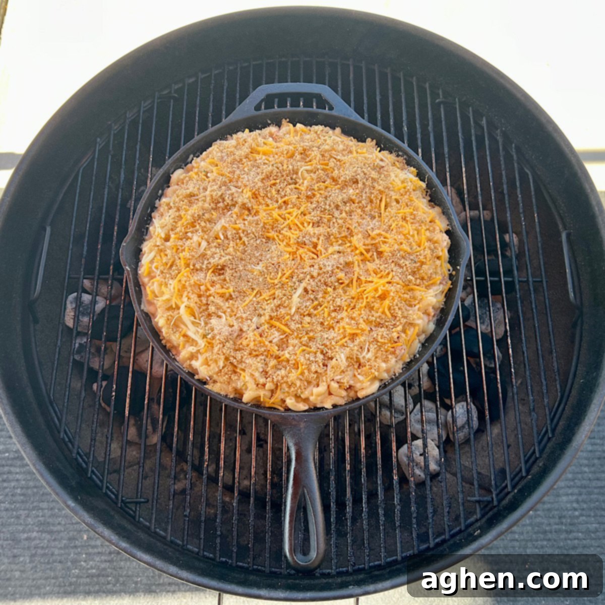 raw mac & cheese on grill grate