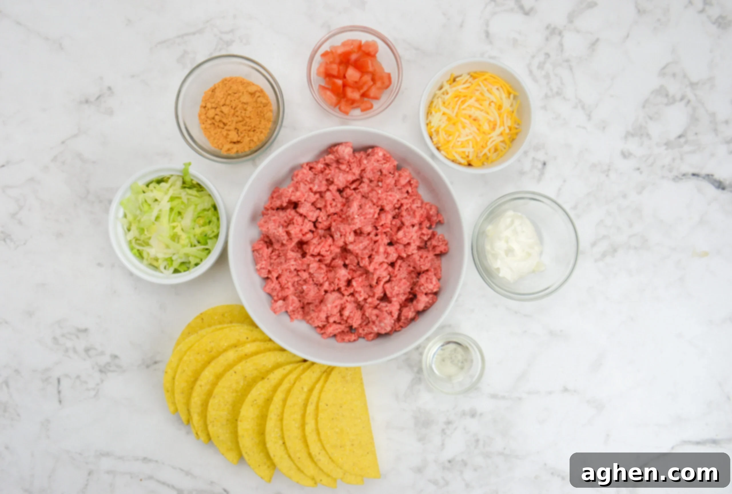 The Backyard's Best: Blackstone Tacos 3 The ingredients to make Blackstone tacos in separate small bowls. The ground beef sits at the center.