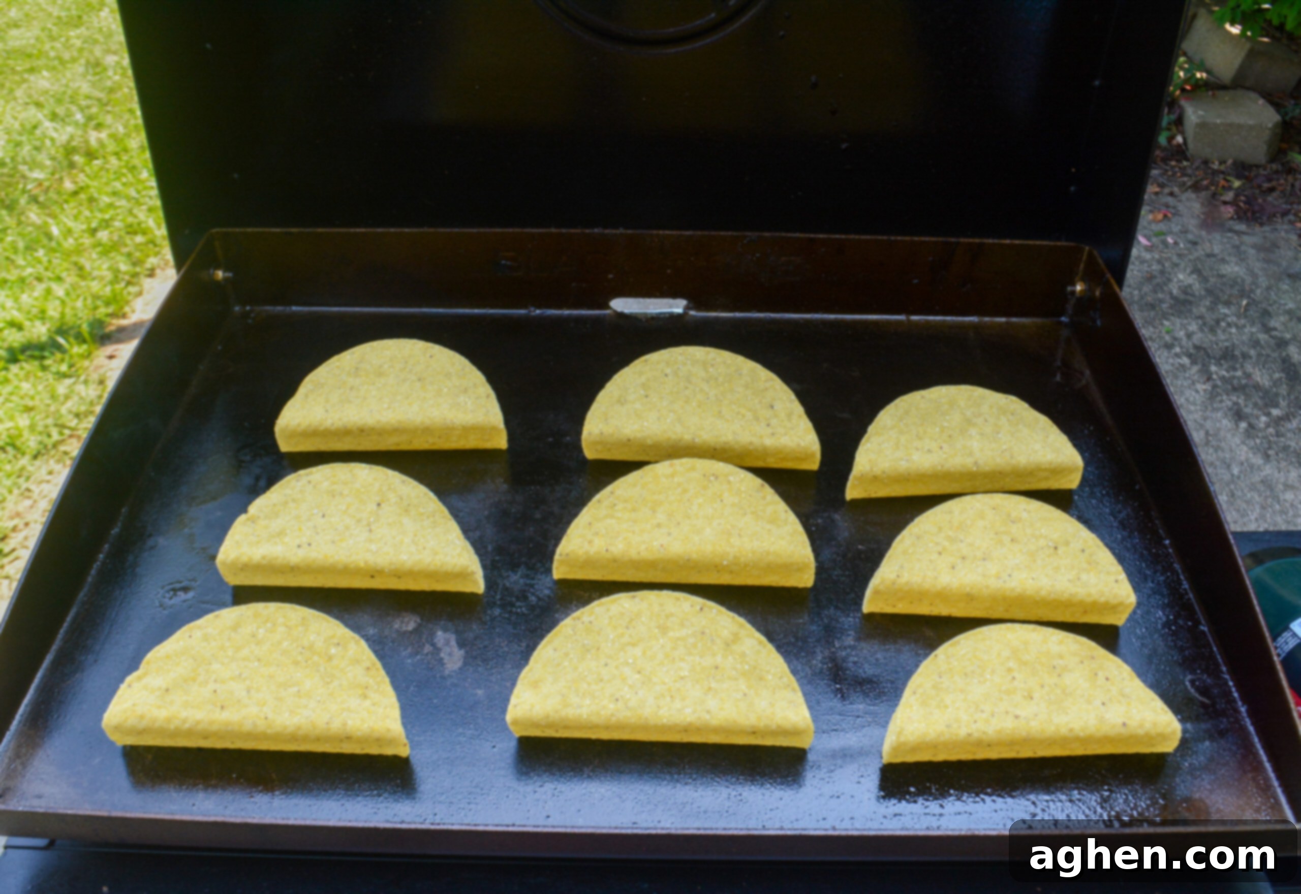 The Backyard's Best: Blackstone Tacos 6 Three rows of crunchy taco shells on the griddle.