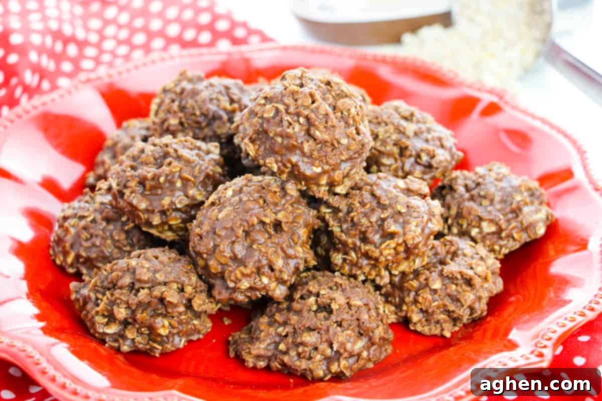 A generous stack of no-bake Nutella cookies artfully arranged on a red plate, showcasing their rich, chocolatey goodness and tempting texture.