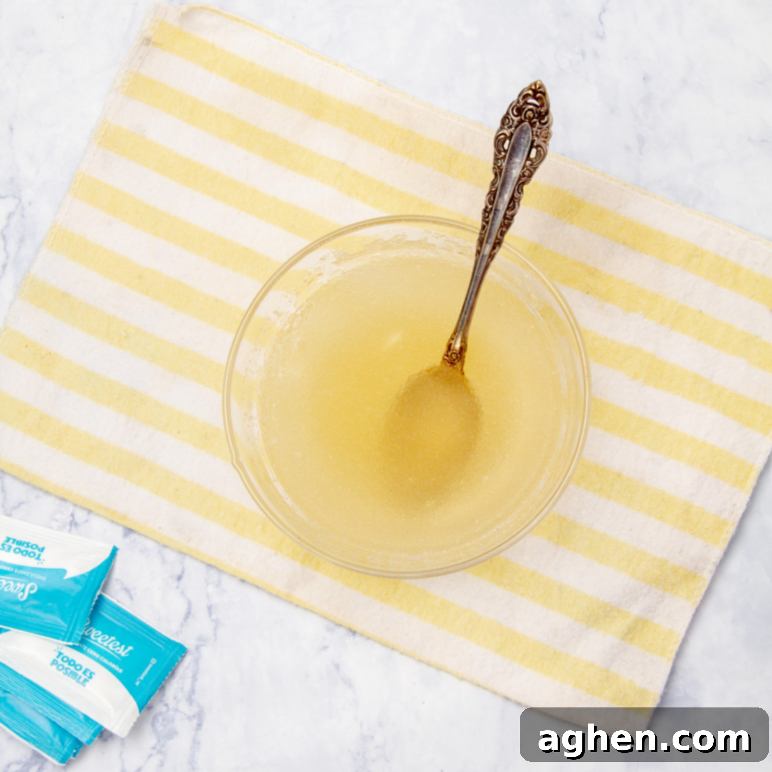 Gelatin mixed with water in a bowl, demonstrating the blooming process.