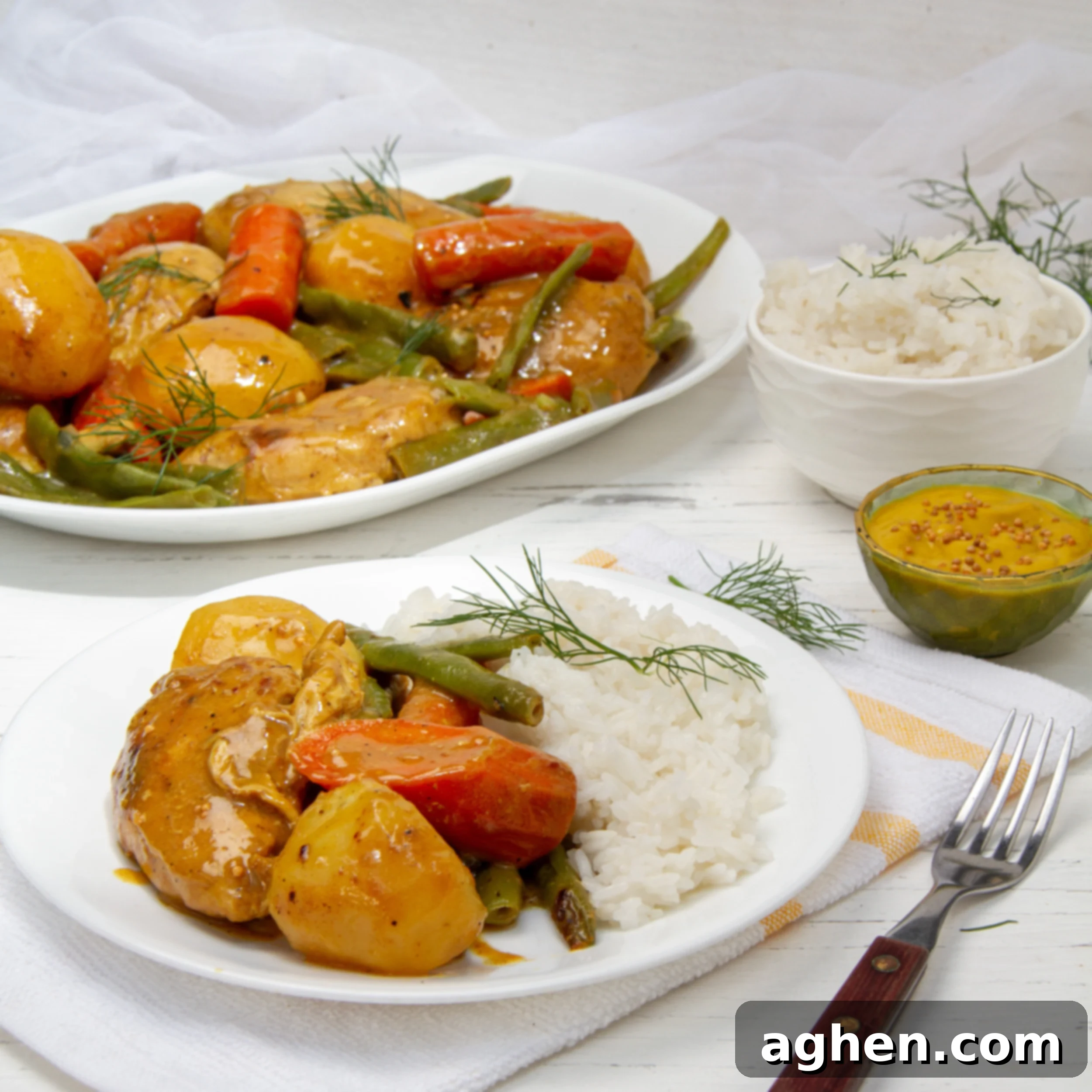 Classic one-pot honey mustard chicken and vegetabes with a vibrant golden-brown glaze.
