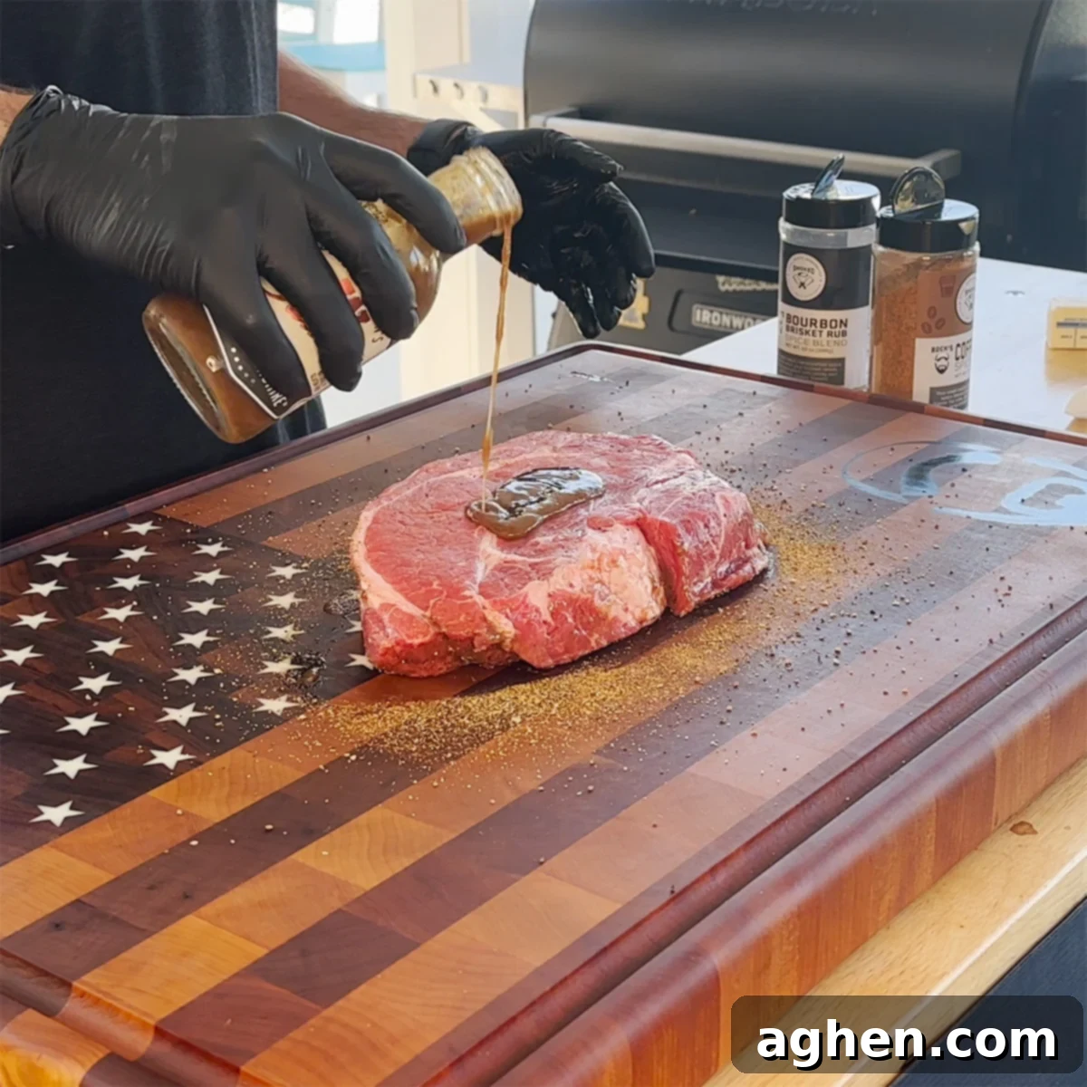 A chuck roast, perfectly seasoned with a dark rub, ready to be placed on the smoker grates.