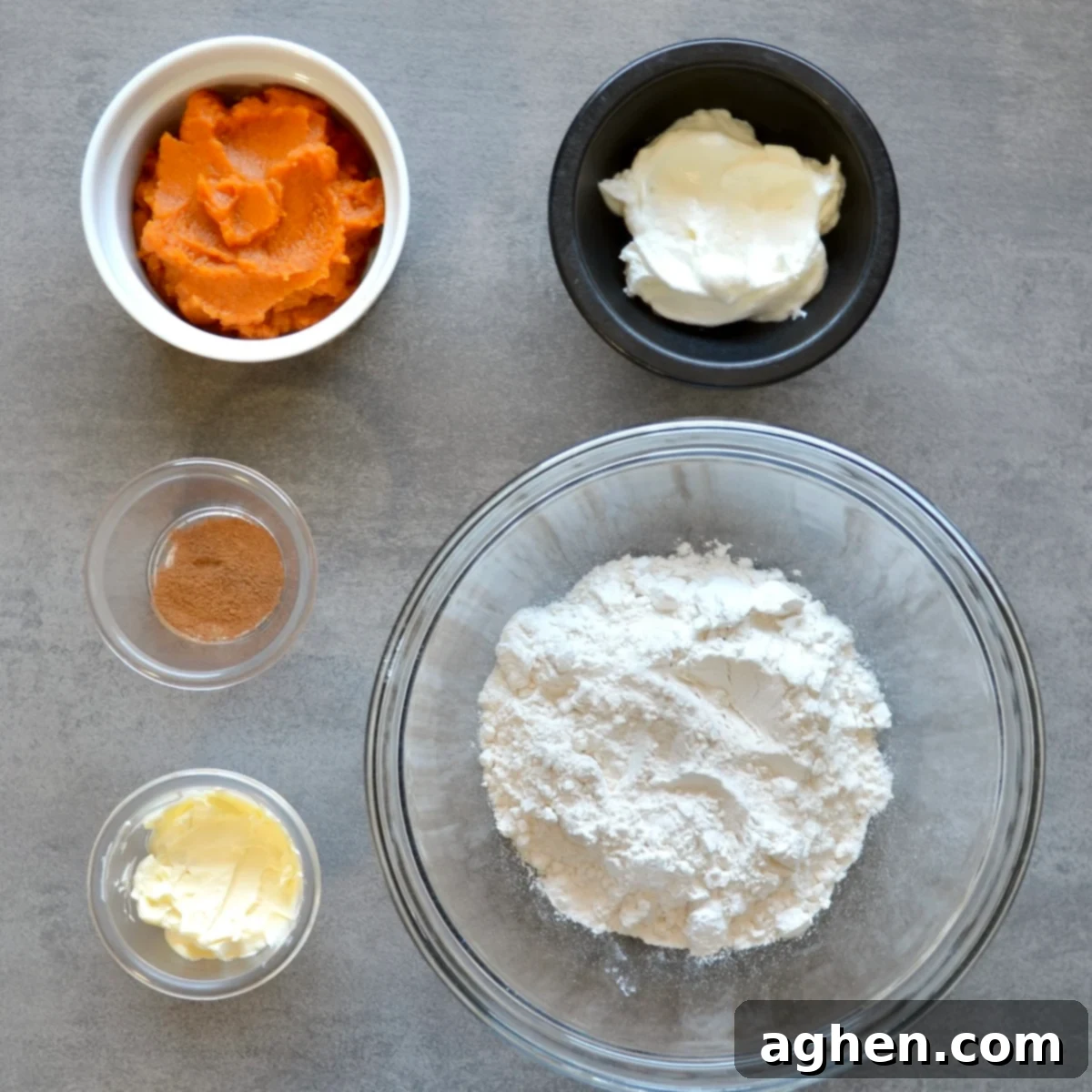 All the ingredients neatly arranged for making pumpkin dinner rolls