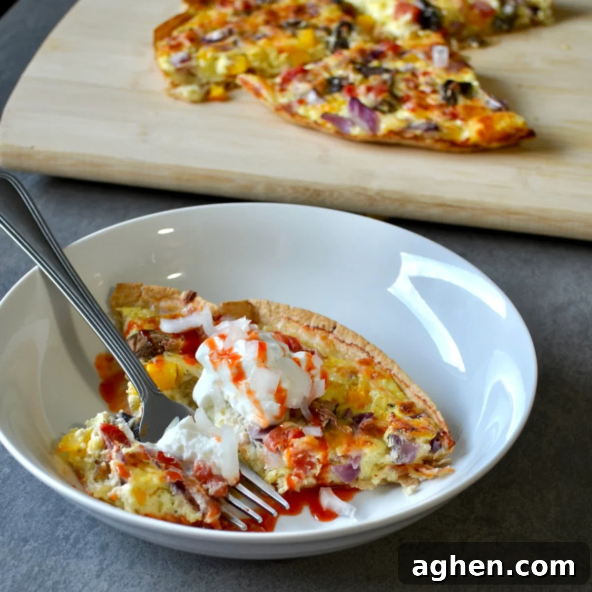 Skinny Tortilla Quiche Bake 2 Quiche with greek yogurt and hot sauce on top