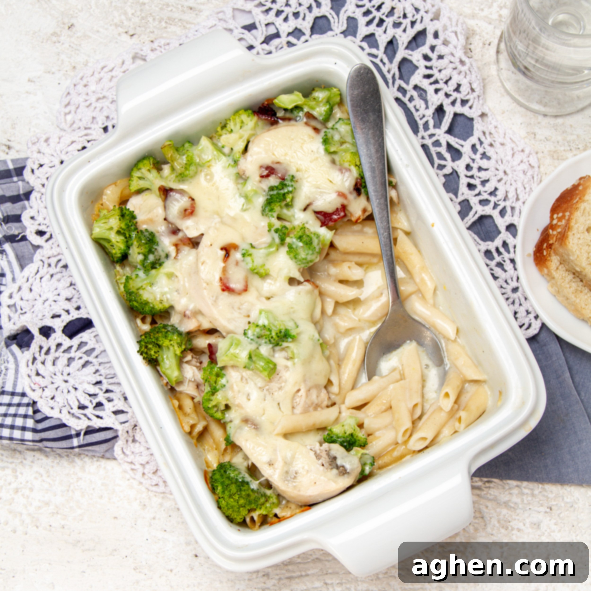 Chicken Bacon Alfredo Pasta Bake 2 Rich, creamy, and satisfying—Chicken bacon alfredo pasta bake in a casserole dish, ready for eating!