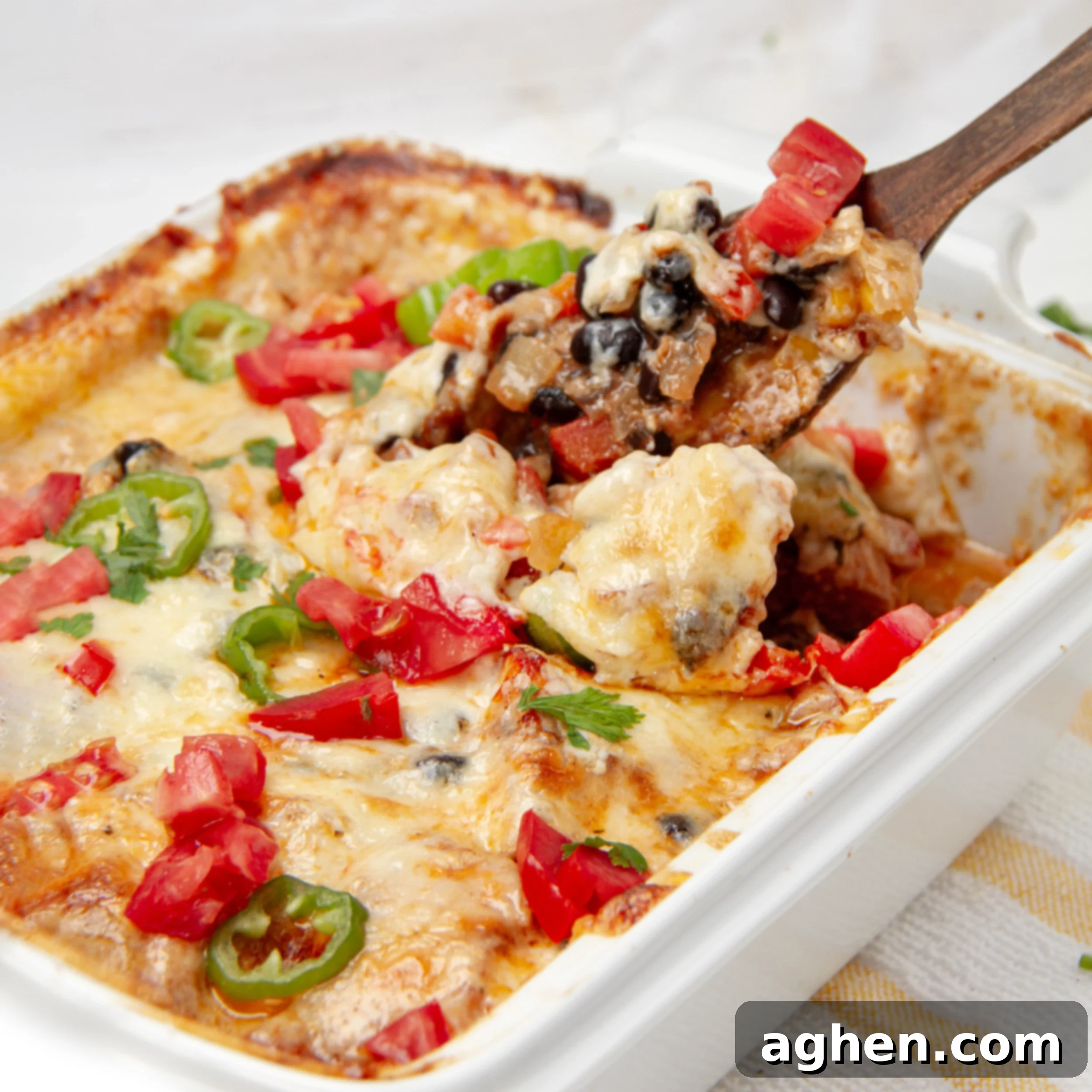 Your Go-To Weight Watchers Mexican Chicken Casserole 2 Cheesy Mexican Chicken Casserole in a baking dish, freshly baked and golden brown.