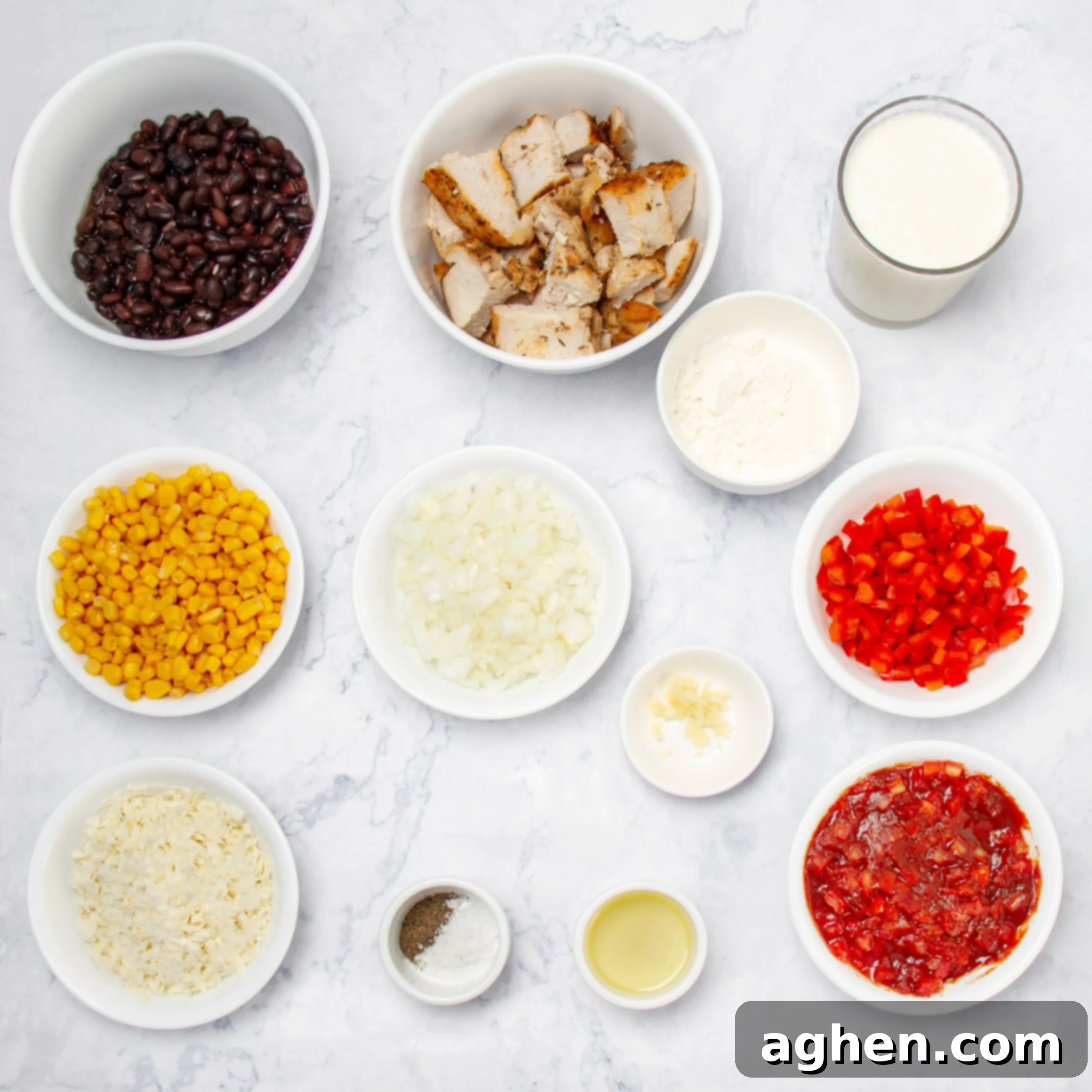 Your Go-To Weight Watchers Mexican Chicken Casserole 3 All the vibrant ingredients for Mexican Chicken Casserole arranged in separate dishes on a rustic wooden table.