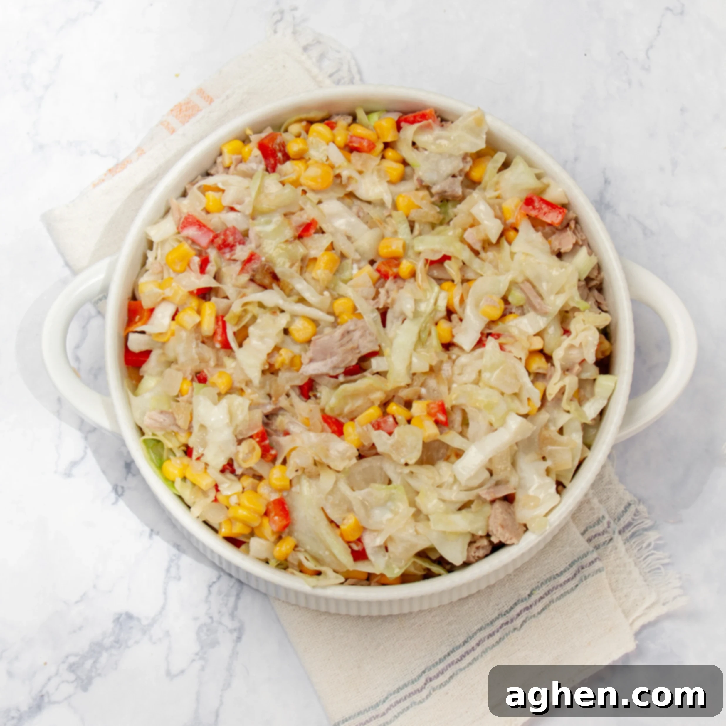 Healthy Weight Watchers Tuna Casserole 6 Casserole ingredients mixed in a baking dish, perfectly prepared and ready to go into the oven for baking.
