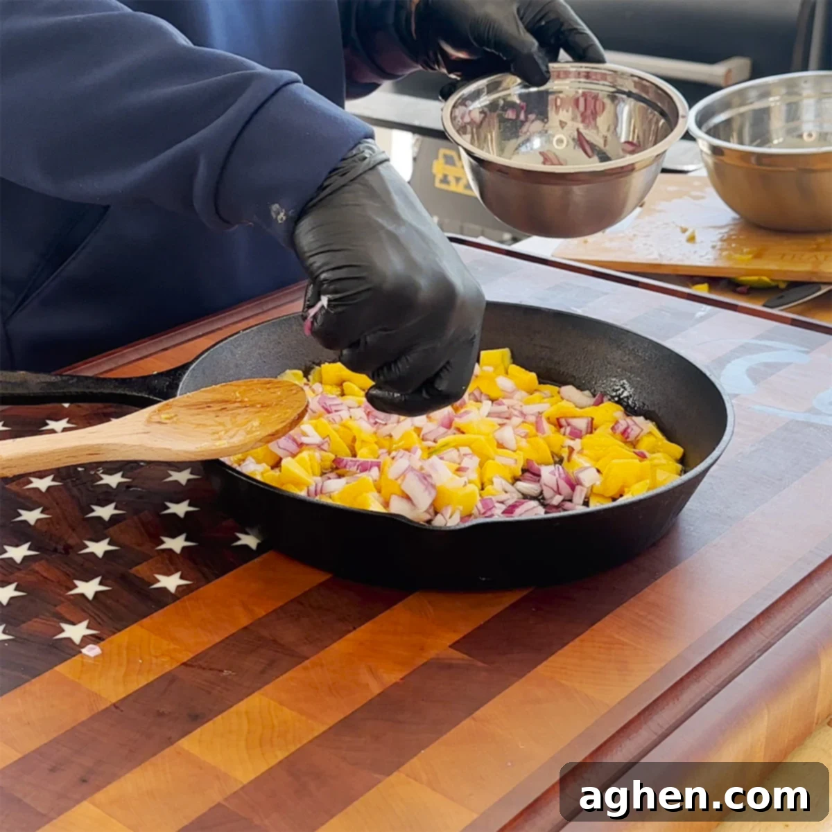 All chutney ingredients combined in a cast iron pan