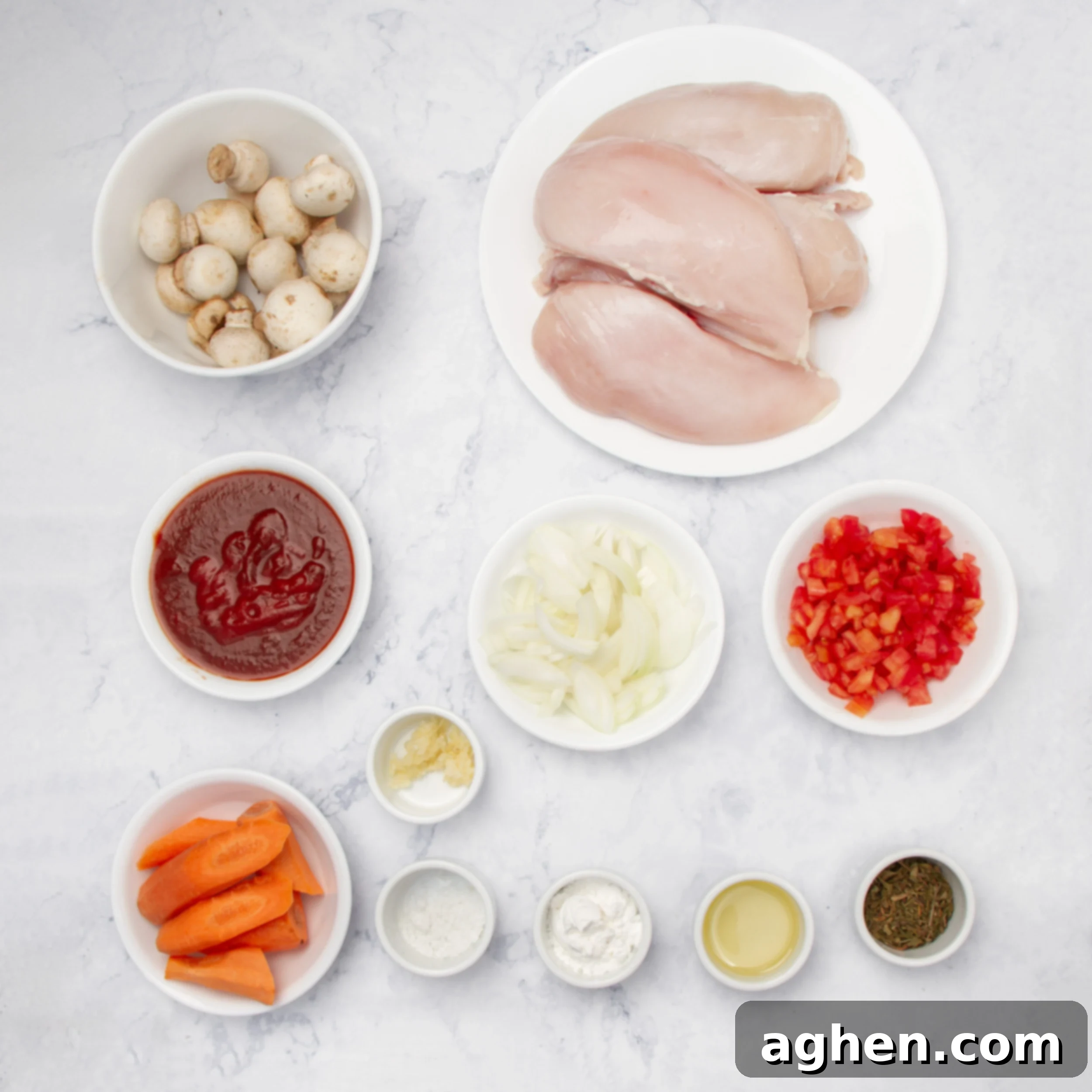 French Chicken Chasseur ingredients in separate dishes on a countertop. 