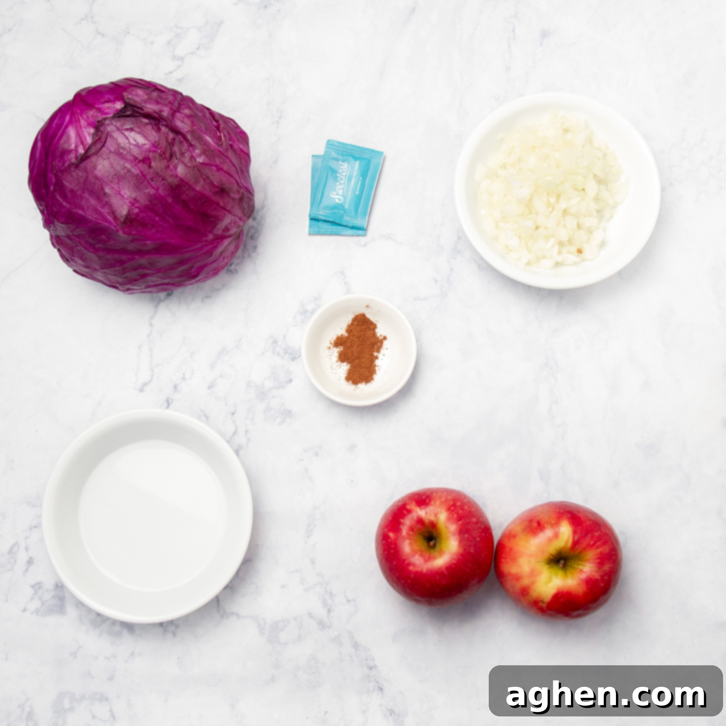 Slow Cooker Tangy Red Cabbage 3 Slow cooker tangy red cabbage ingredients in separate dishes on the counter.