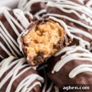 No-Bake Peanut Butter Crunch Bites 11 Peanut Butter Ball with Rice Krisipes cut in half to show crunchy texture.