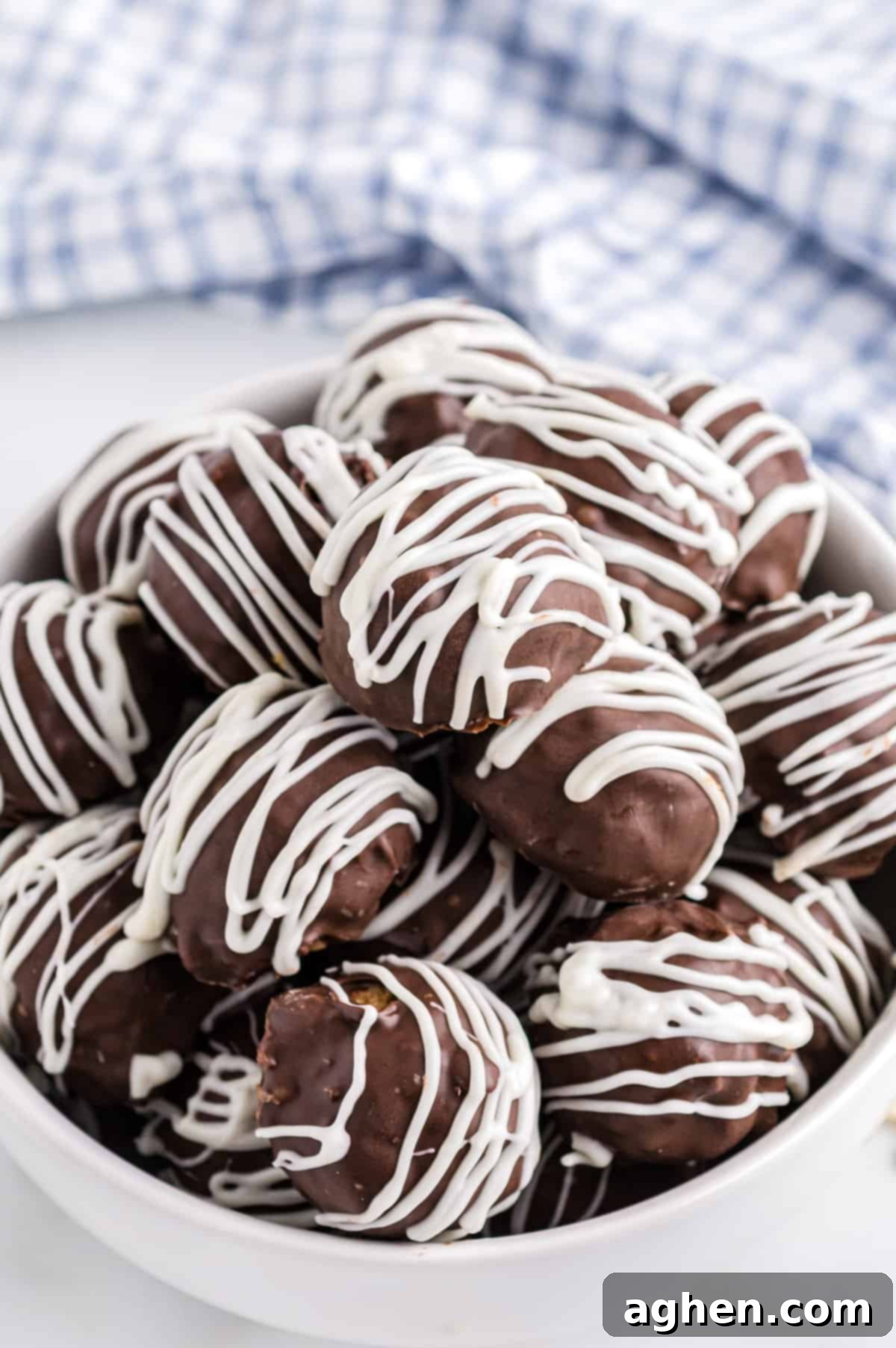 No-Bake Peanut Butter Crunch Bites 10 Bowl of chocolate covered rice krispies balls, ready to be enjoyed.