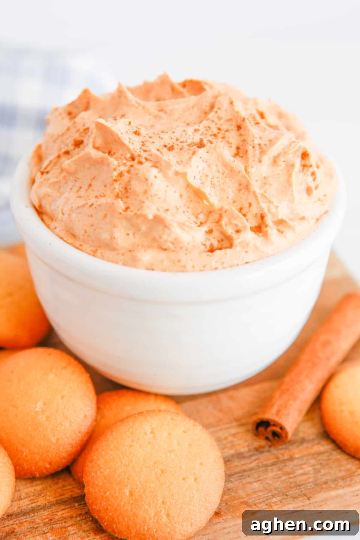 Light and fluffy pumpkin fluff made with cool whip and served with vanilla wafers for dipping