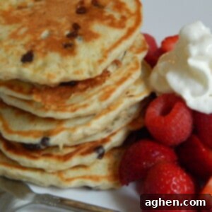 Fluffy Banana Oatmeal Chocolate Chip Pancakes 2 Close-up of golden banana oatmeal chocolate chip pancakes
