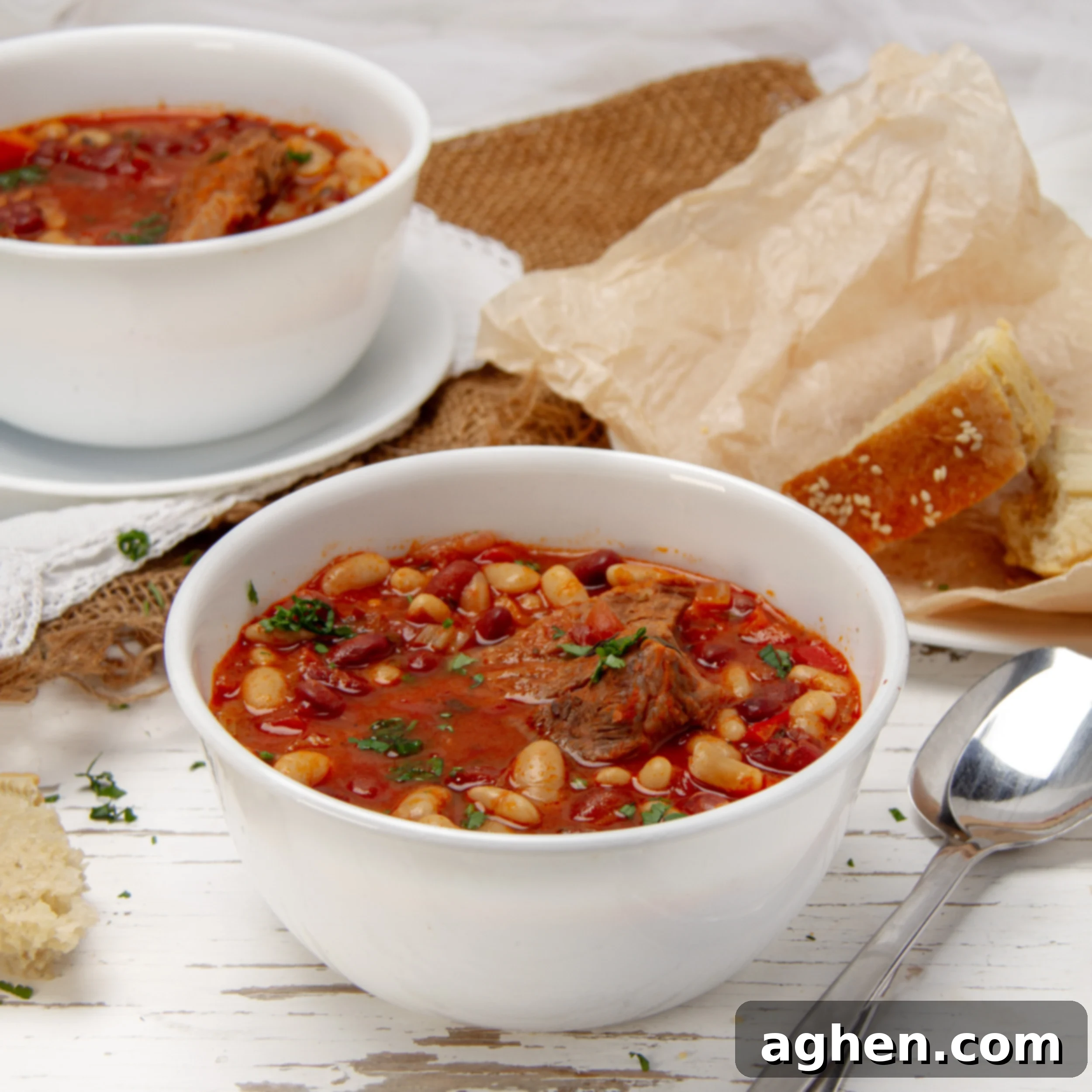 Faux Campfire Stew 2 Hearty and satisfying Campfire Stew in a bowl with a spoon on the side.