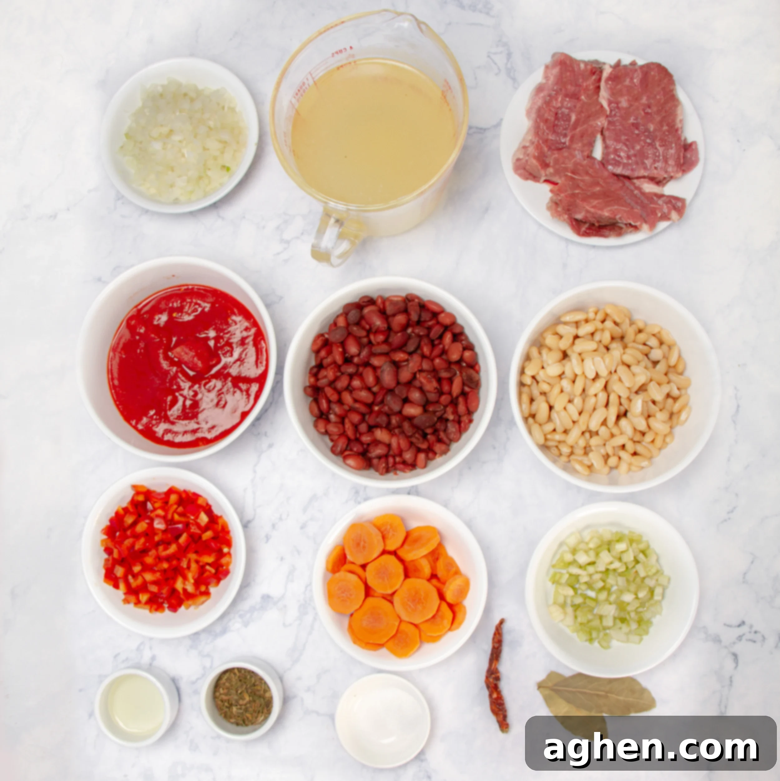 Faux Campfire Stew 3 Campfire Stew ingredients in separate dishes on a countertop.