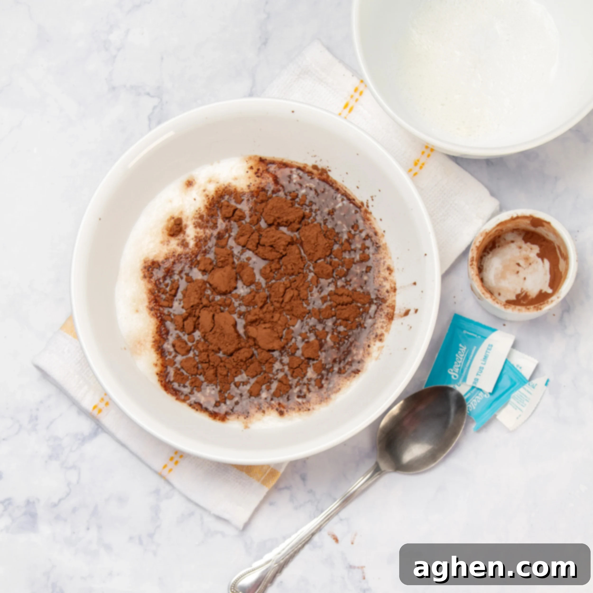 Chocolate Oat Bliss 4 Coco powder and milk in a small bowl.