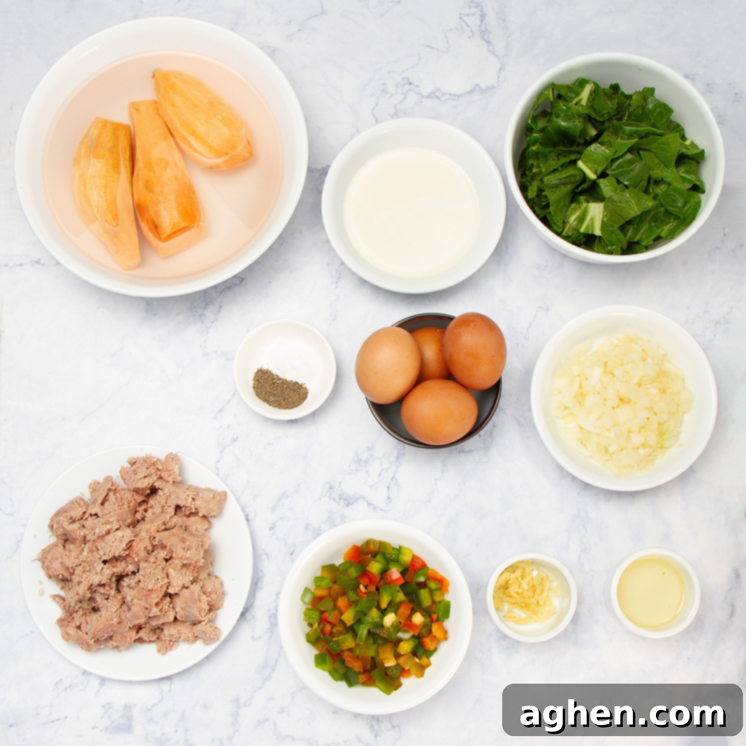 Sweet Potato Sausage Breakfast Casserole ingredients in separate dishes. 