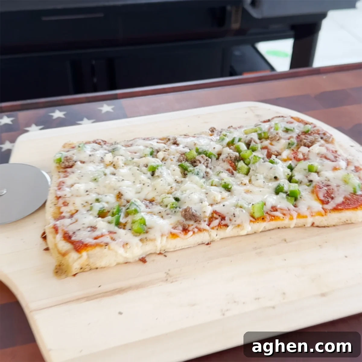 Griddle Pizza: My New Culinary Addiction 2 Freshly cooked griddle pizza on a Traeger Flatrock, sliced and ready to serve.