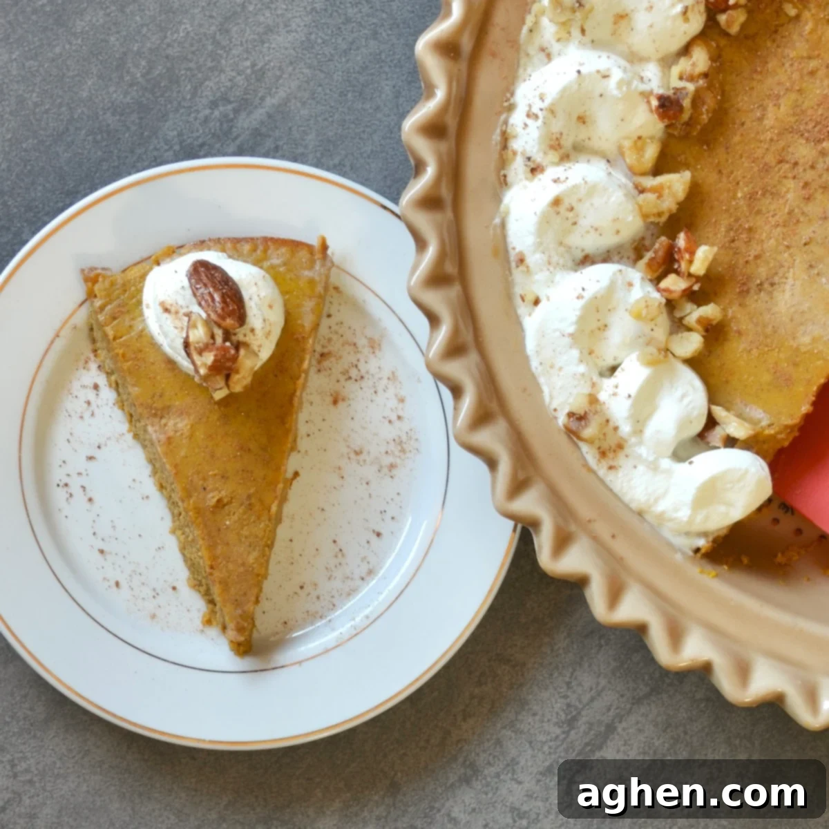 A perfectly sliced Weight Watchers Crustless Pumpkin Pie, showing its smooth, creamy texture and golden-brown edges.