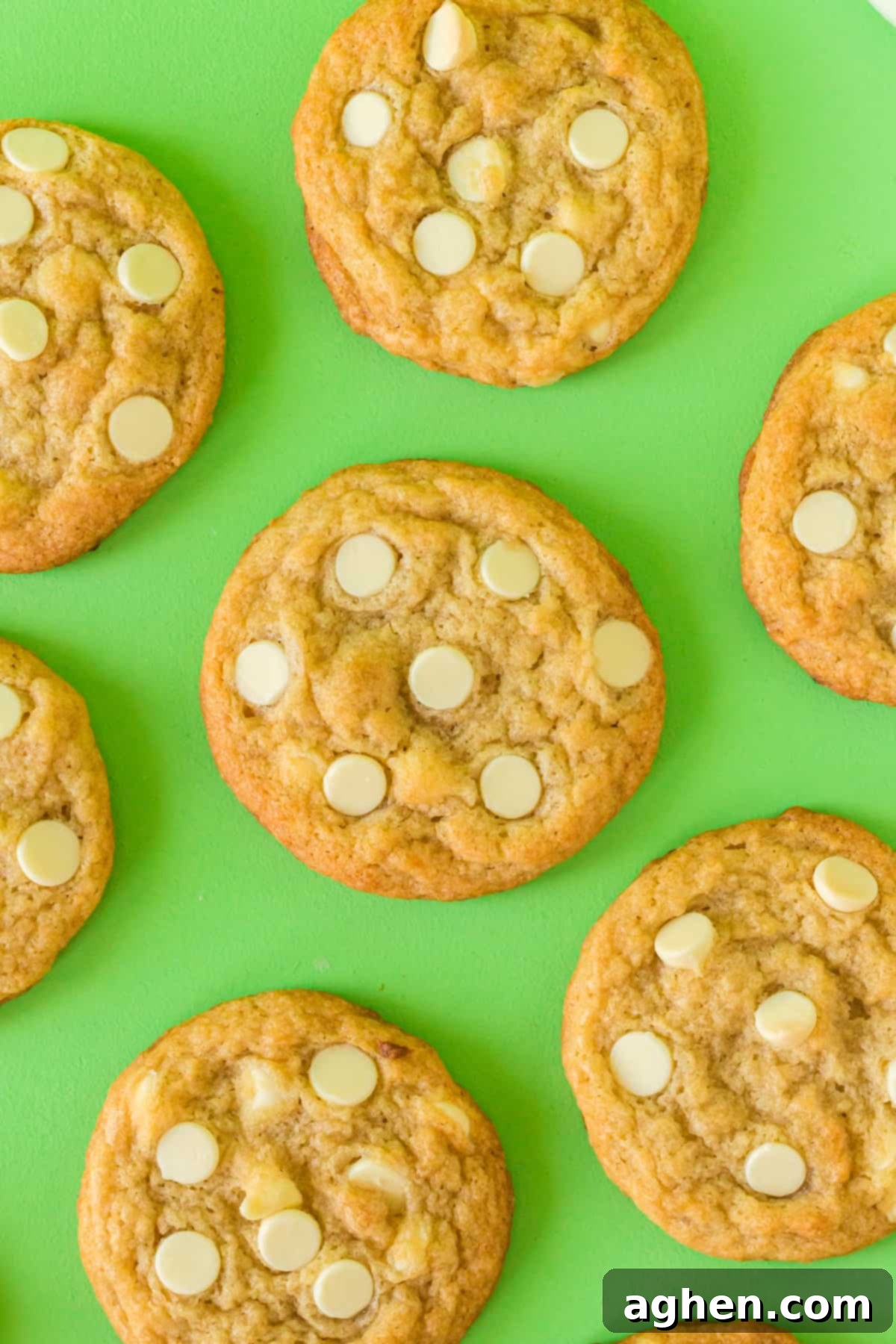 Banana Cookies with White Chocolate Chips on green background.