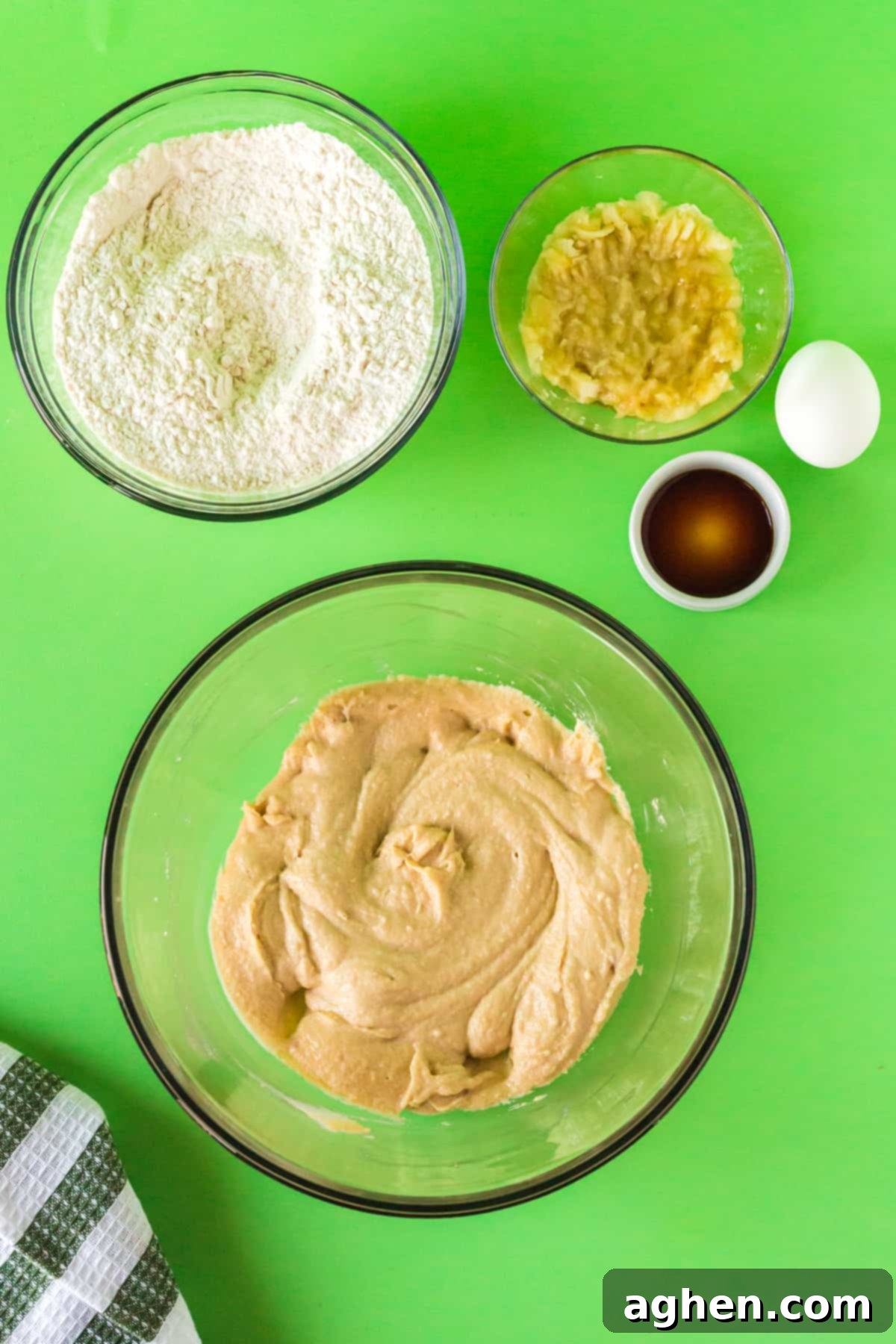 Large mixing bowl with creamed butter and sugar.