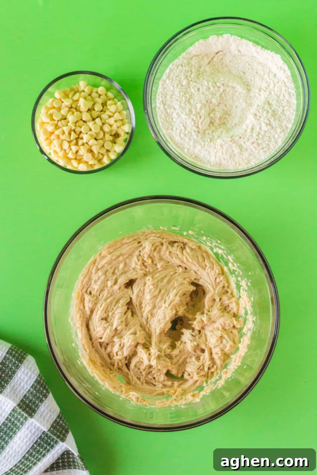 Wet ingredients mixed in a large glass bowl.