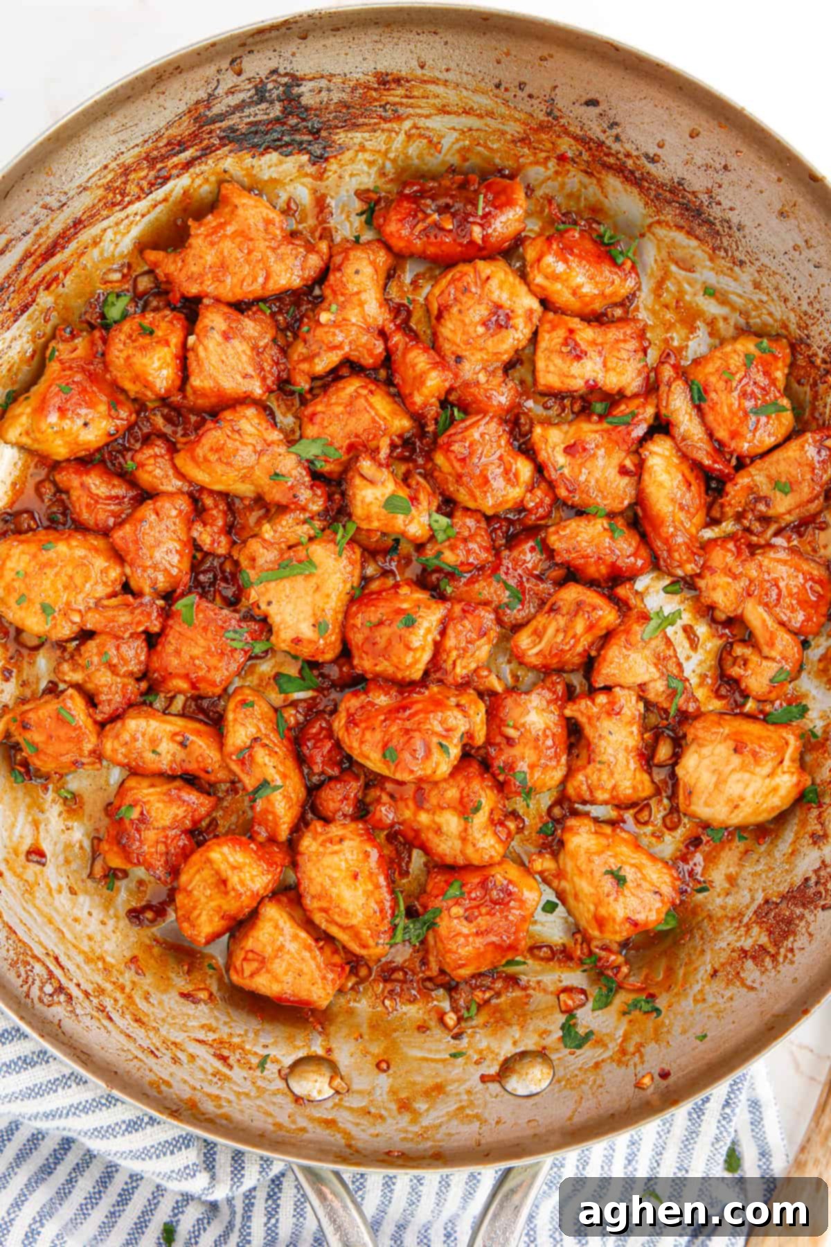 Spicy Honey Garlic Chicken Breast Bites in large skillet