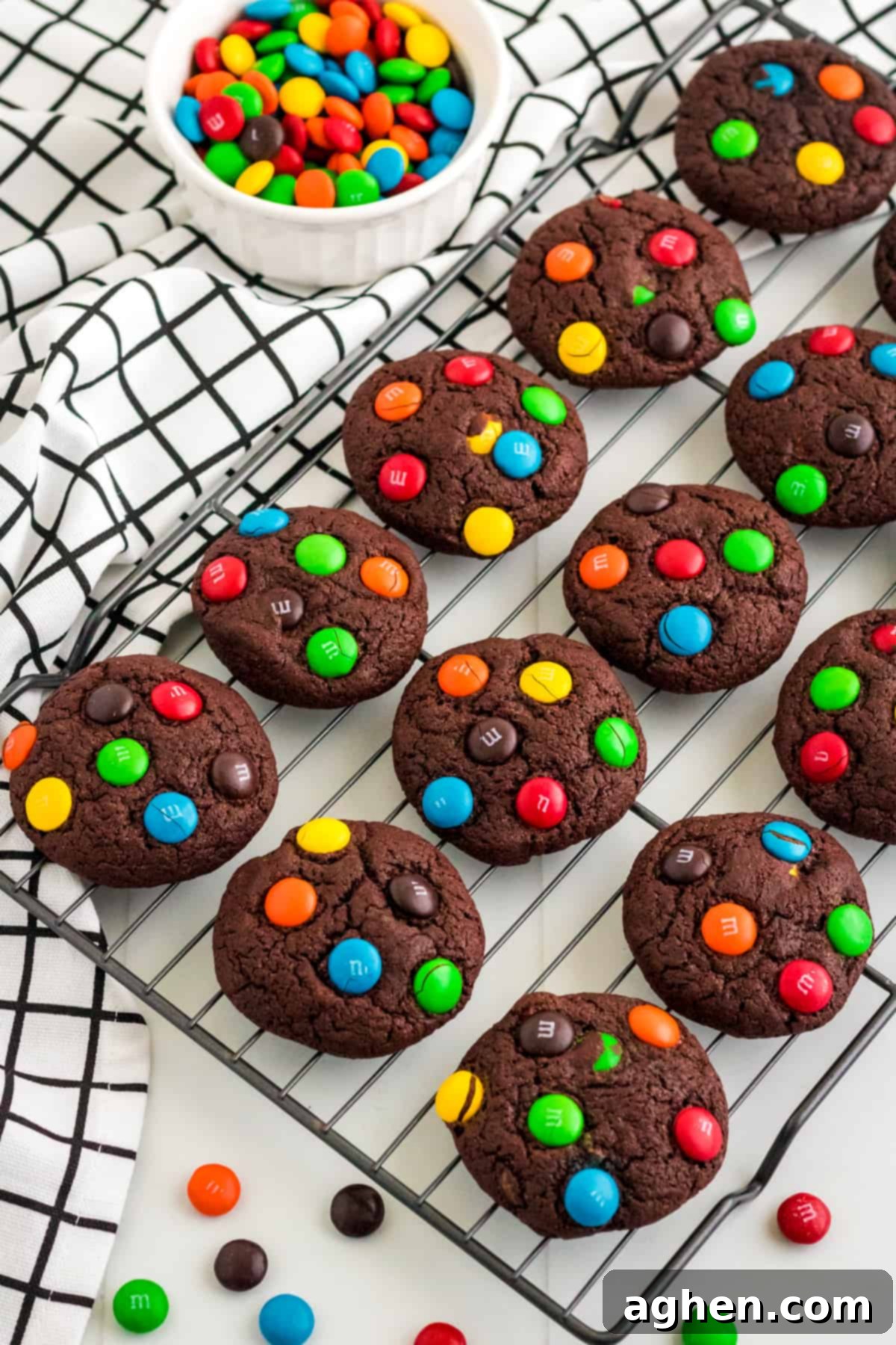 Easy M&M Chocolate Cake Mix Cookies 8 M&M Chocolate cake mix cookies on cooling rack, cooling down after baking.