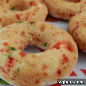 Peppermint Twist Doughnuts 2 Close-up of a festive candy cane donut with crushed topping