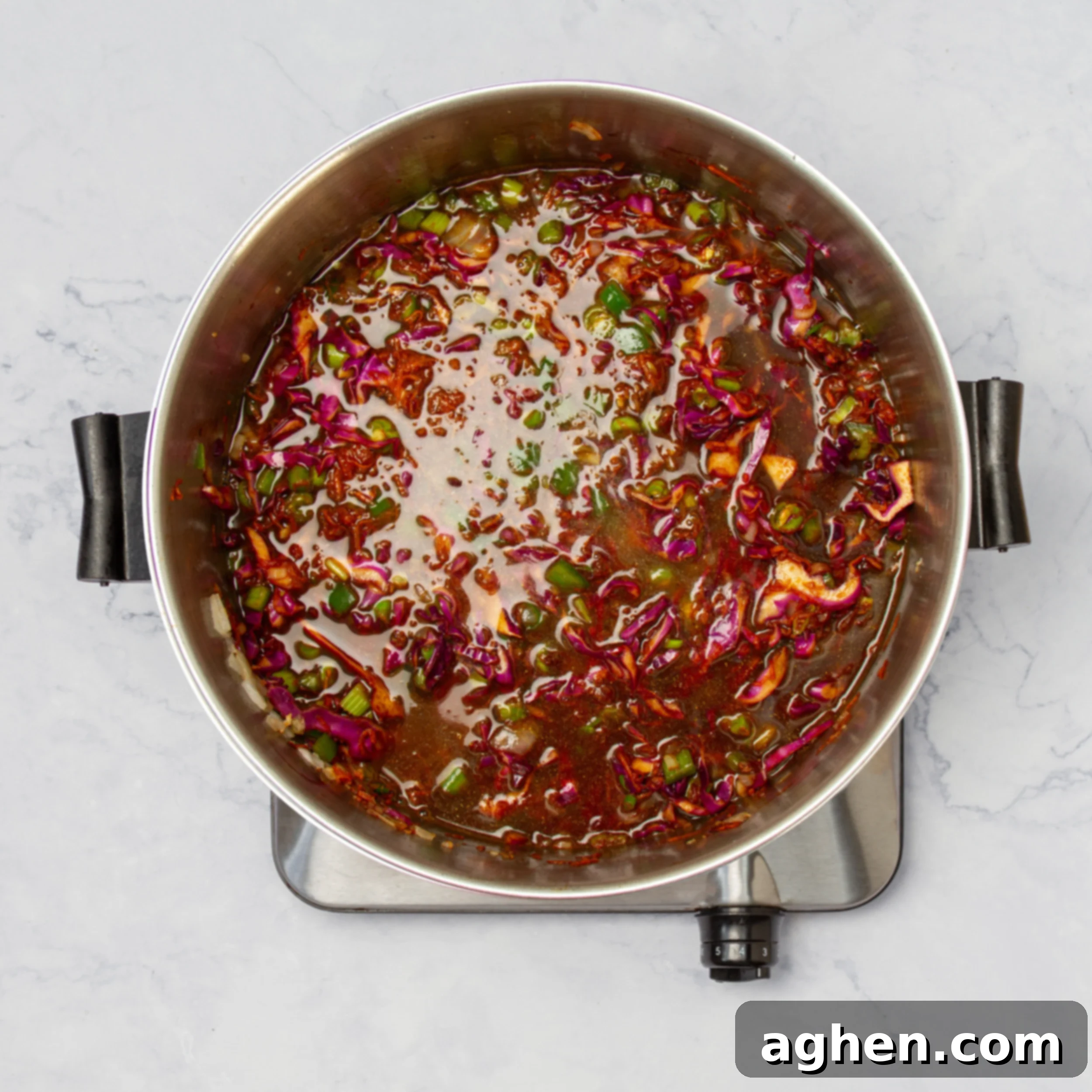 Manchow Soup: A Flavor Explosion 6 Soup ingredients simmering in broth on the stove.