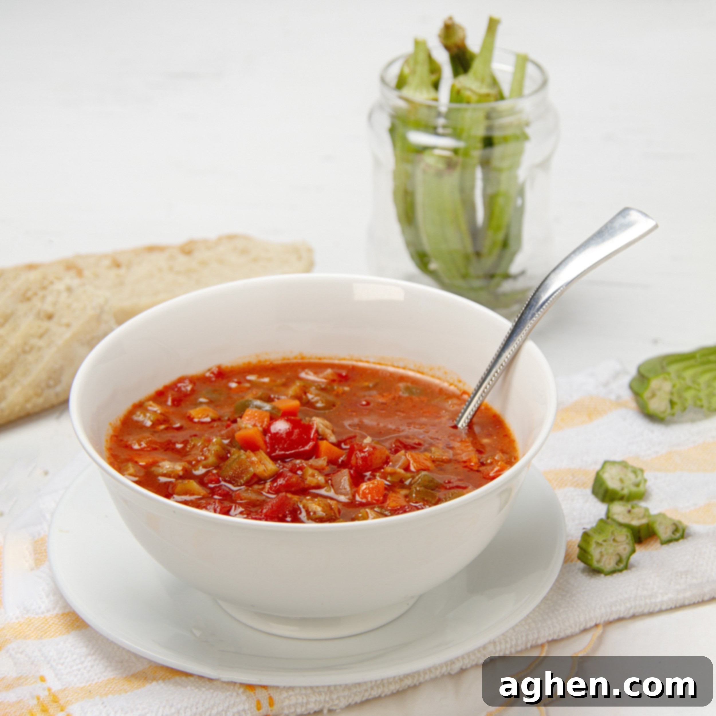 Authentic Okra Goodness 2 Hearty and nutritious Okra Soup in a bowl with a spoon, ready to be enjoyed.