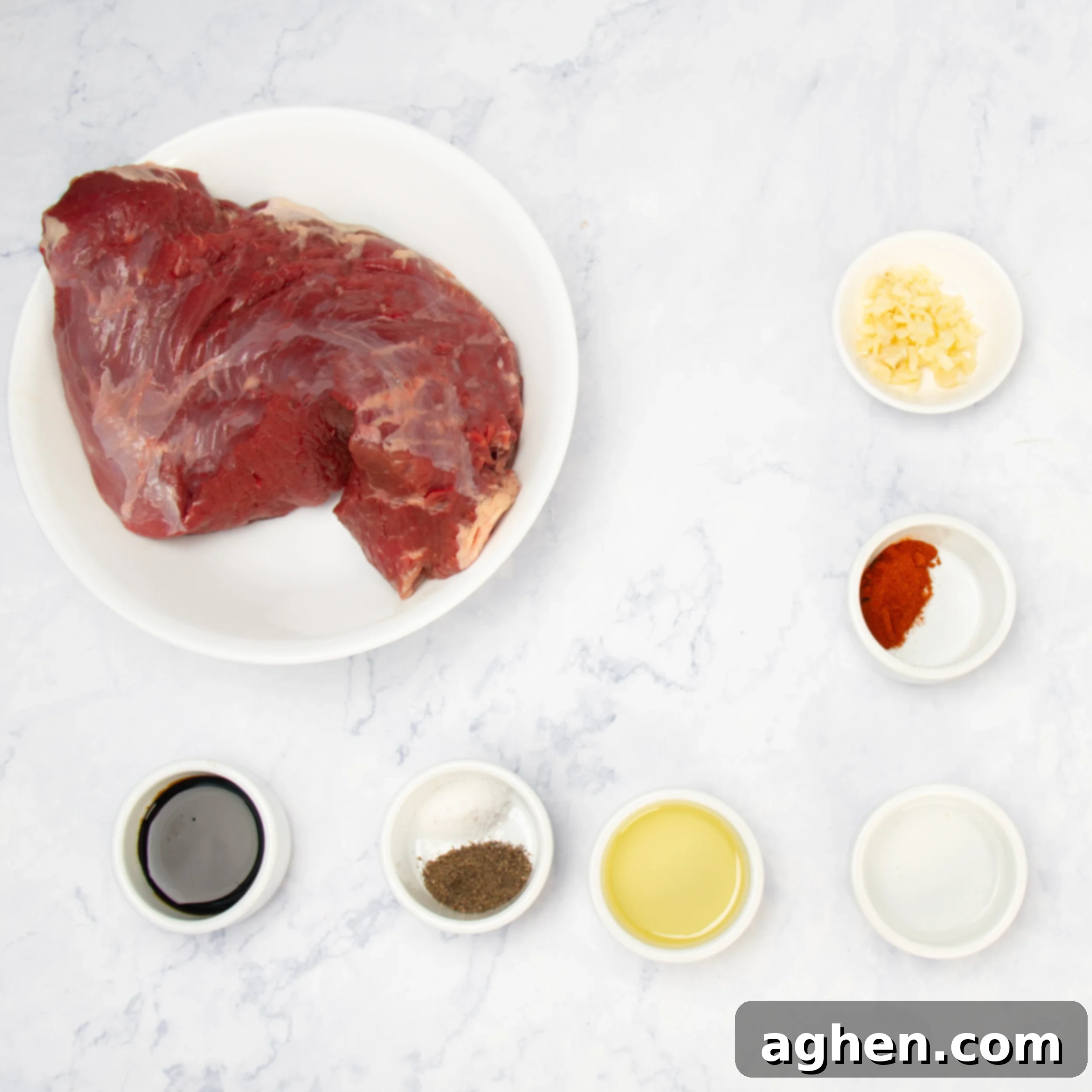 London Broil ingredients in separate dishes on a counter.