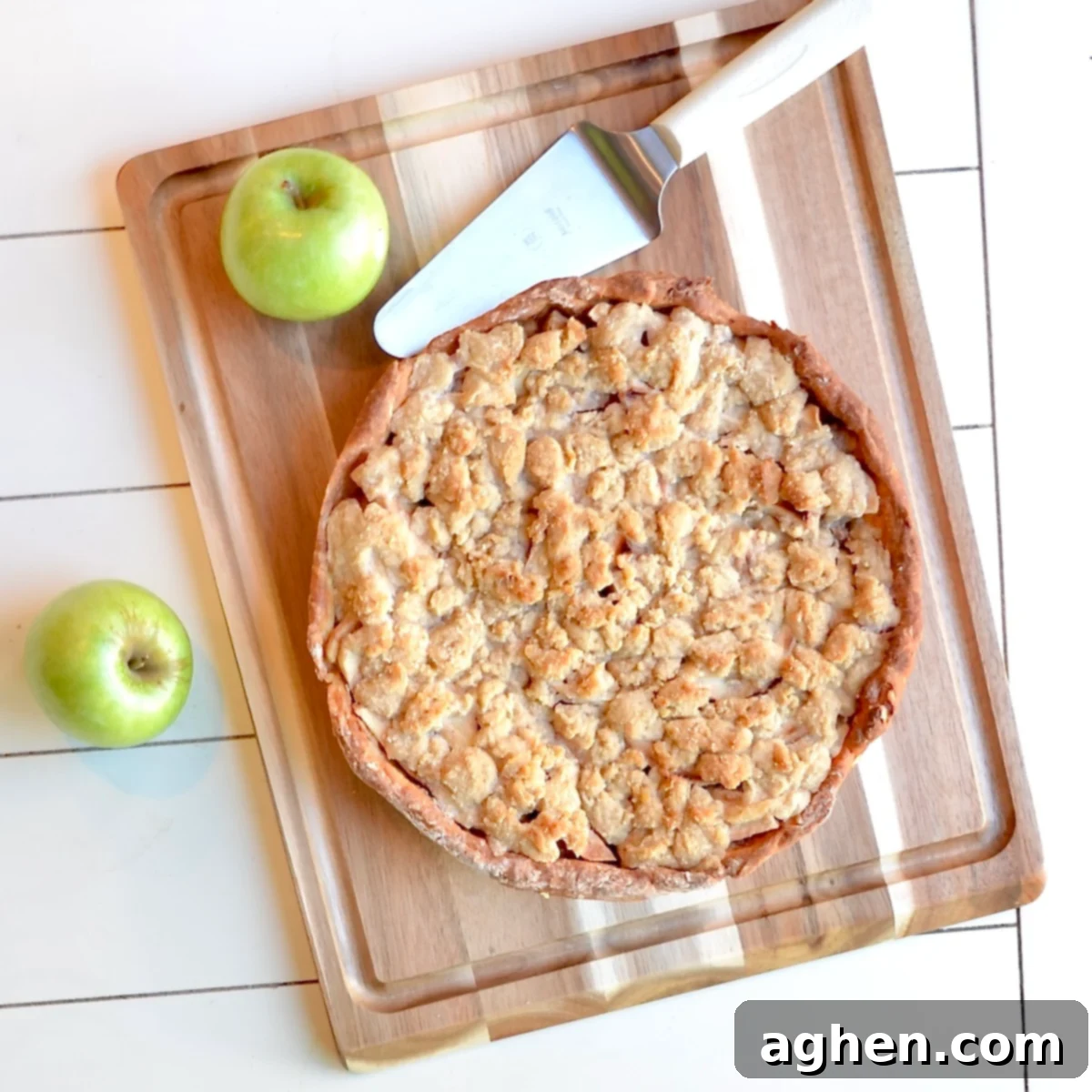 Your Lighter Fall Favorite: Weight Watchers Dutch Apple Pie 6 Freshly baked Dutch apple pie cooling on a wooden cutting board