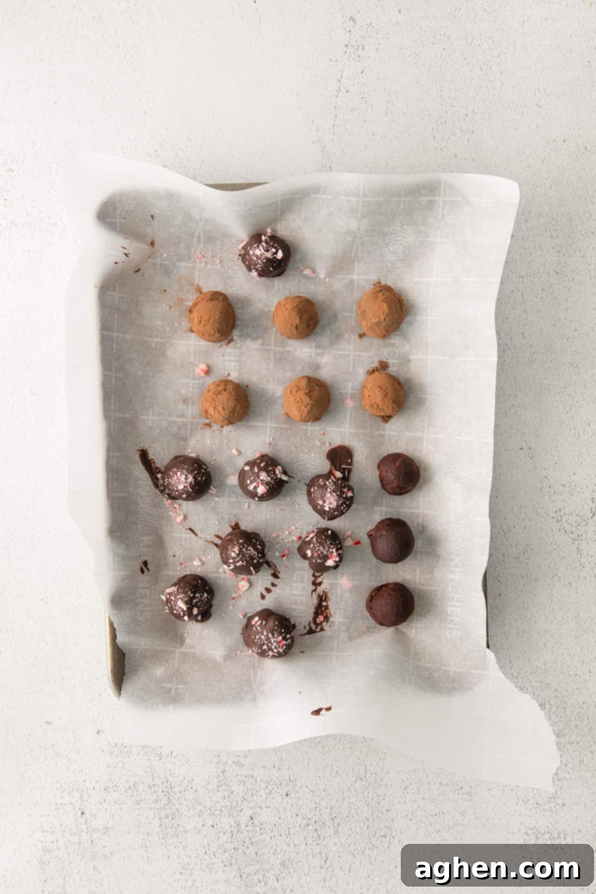 Peppermint schnapps truffles coated in chocolate and topped with peppermint bits, others coated in cocoa powder.