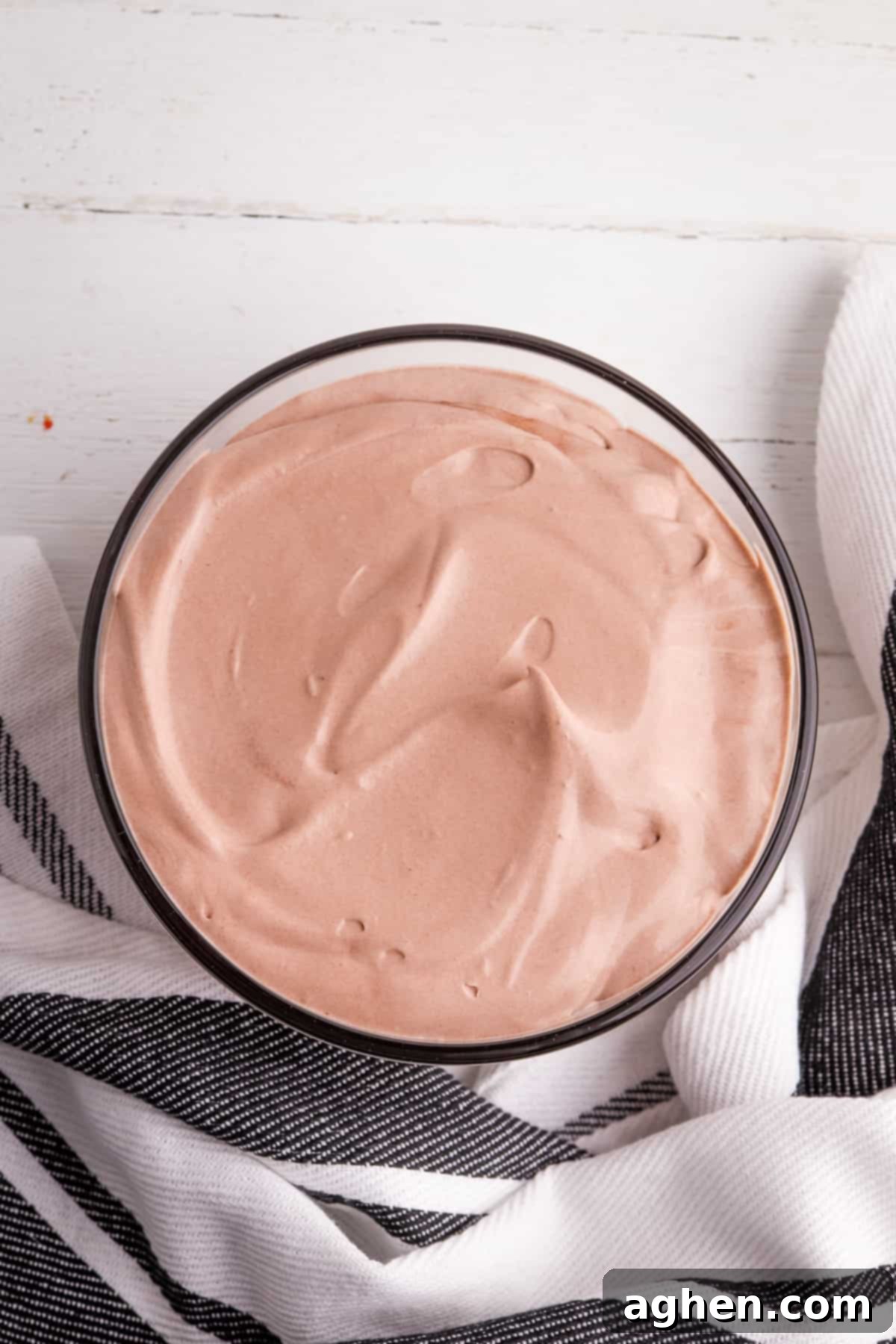 Decadent Chocolate Pie Dip 4 Layered chocolate pudding and cool whip dip in a serving bowl, ready for chilling.