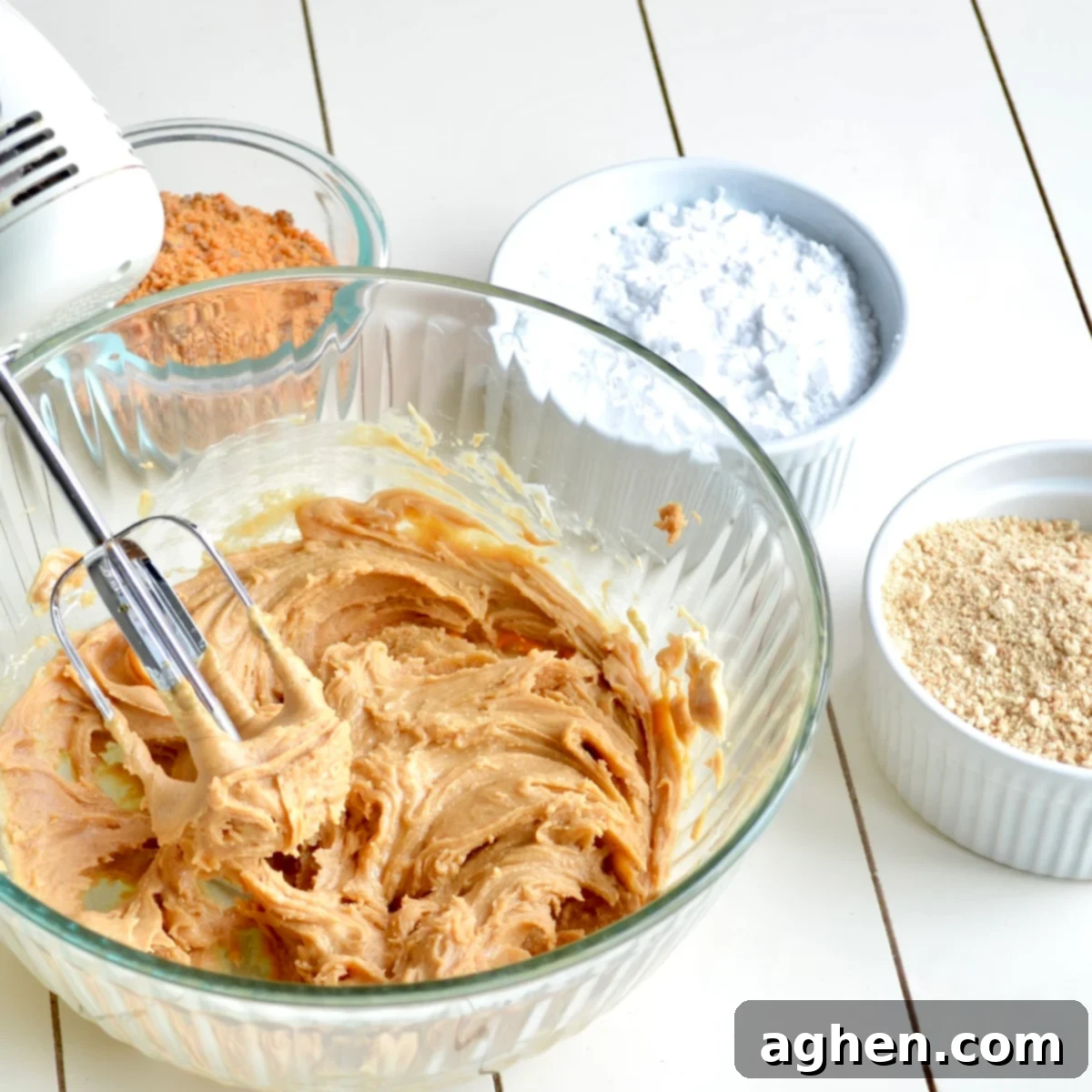 Mixing peanut butter and butter substitute for Butterfinger balls