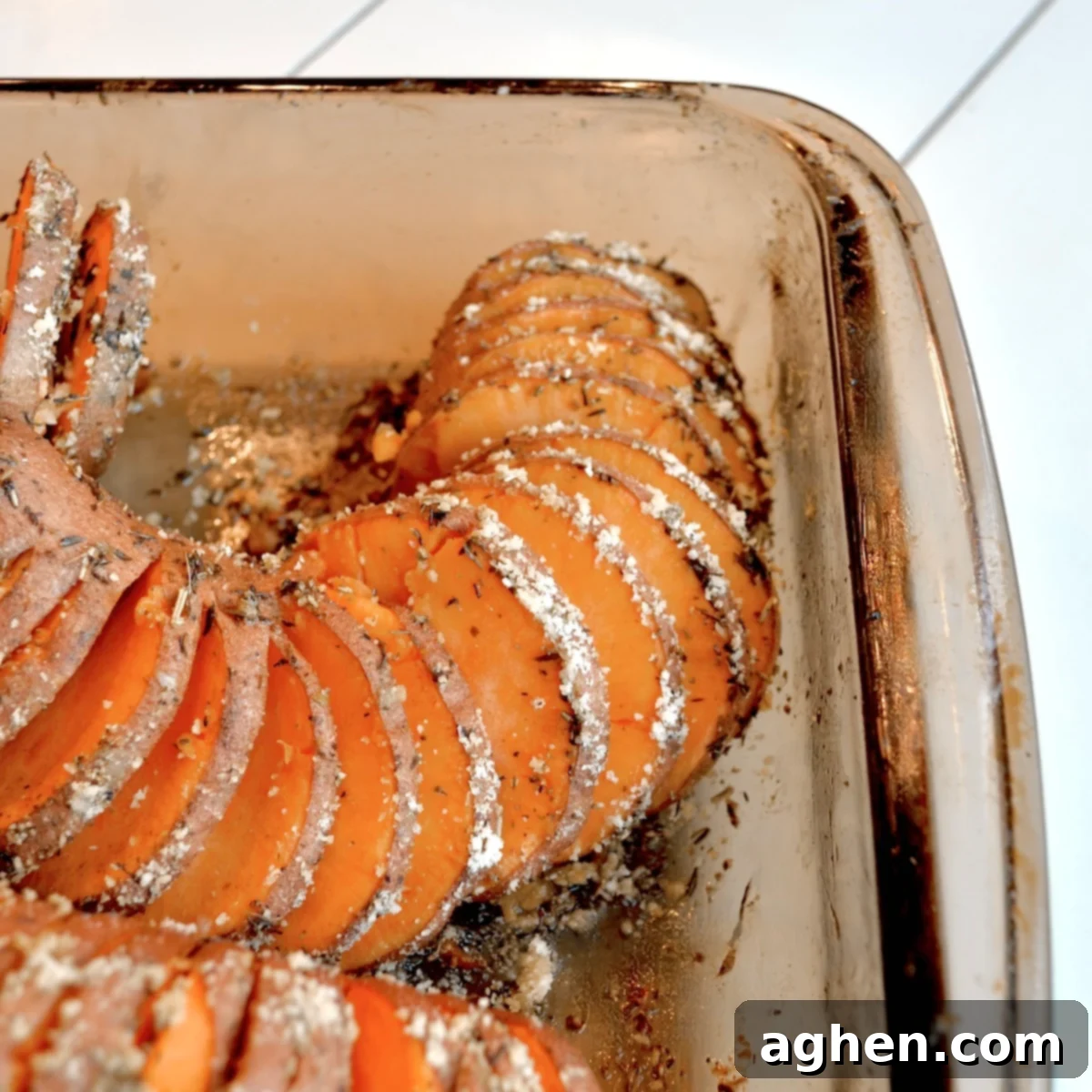 Guilt-Free Hasselback Sweet Potatoes 5 Beautifully sliced Hasselback sweet potatoes ready for baking