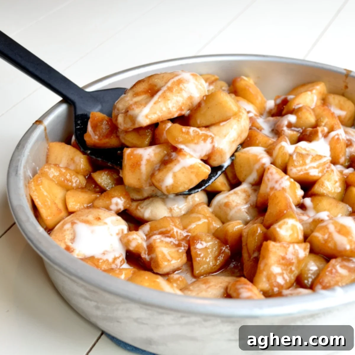 Scooping Weight Watchers Apple Pie Biscuits onto a plate