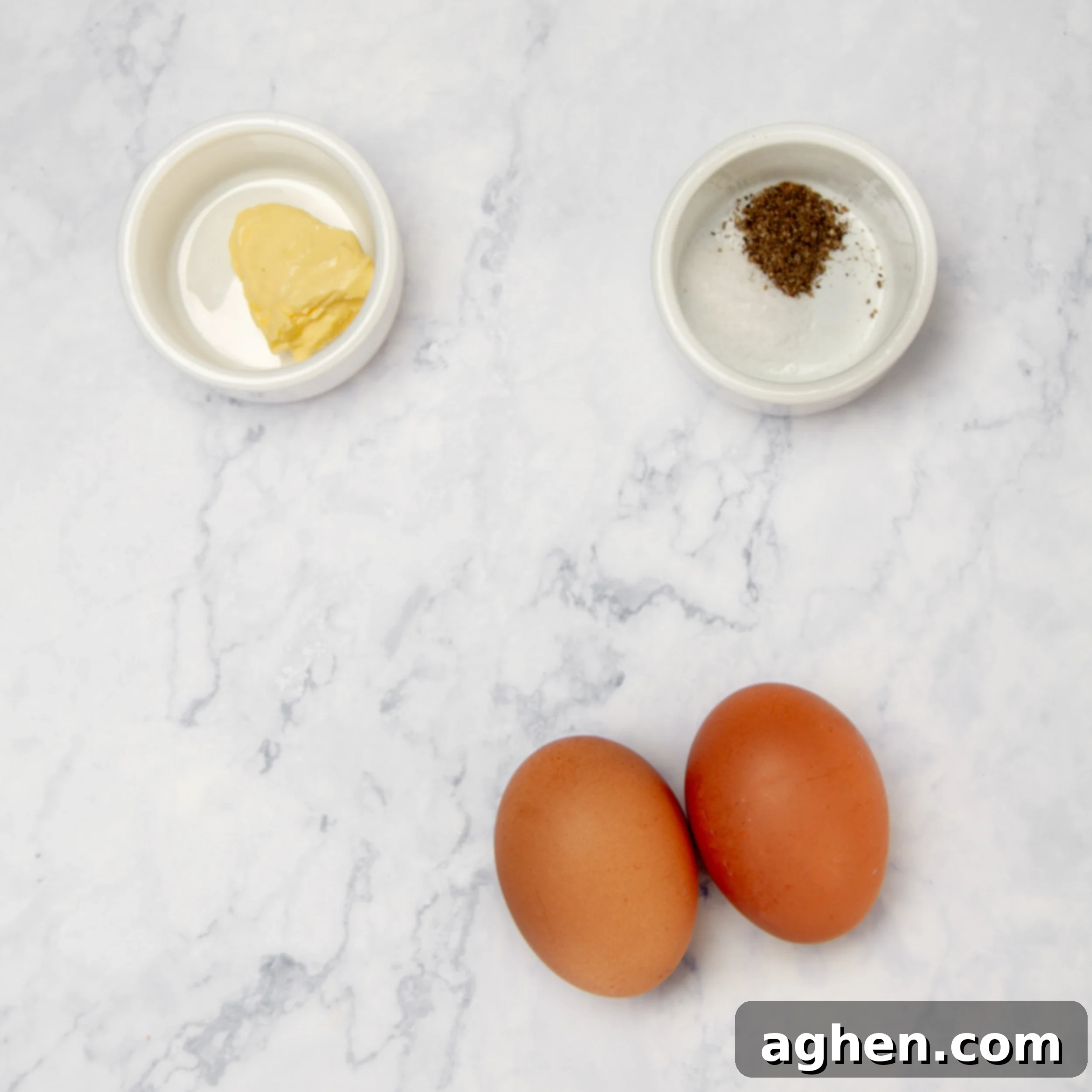 Air Fryer Fried Eggs: Golden, Crispy Perfection 3 Ingredients for air fryer eggs on a counter.